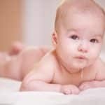 baby spit up after lying down​