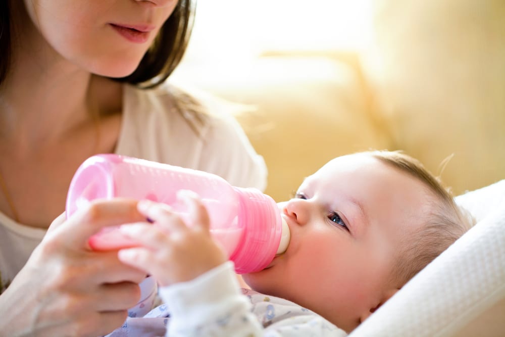 why does baby formula and bottles turn pink