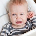 why do my babys ears stink