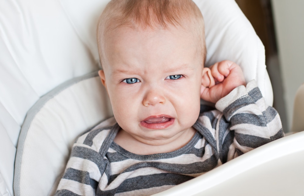 why do my babys ears stink
