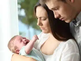 Baby cry when you sit and stand then not