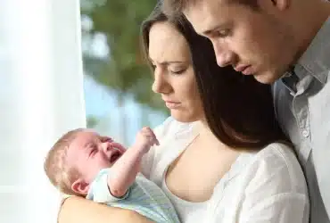 Baby cry when you sit and stand then not