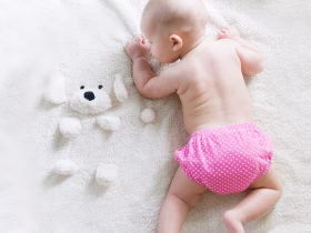 best tummy time pillow position